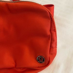New red Lululemon belt bag